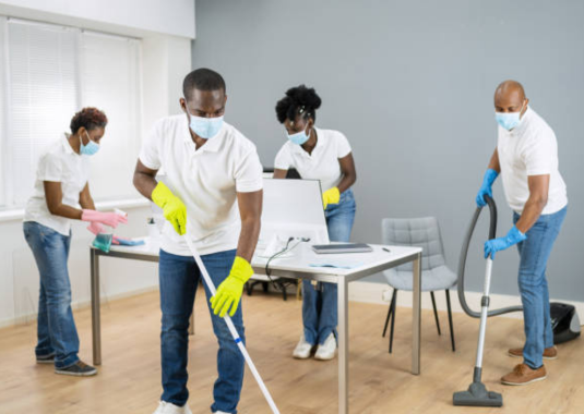 cleaners in the office cleanning the floor